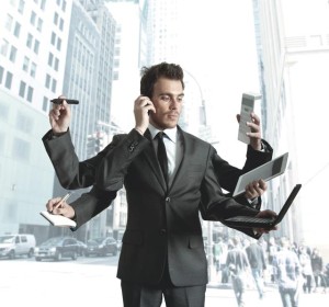 bigstock-businessman-multitasking-34679720